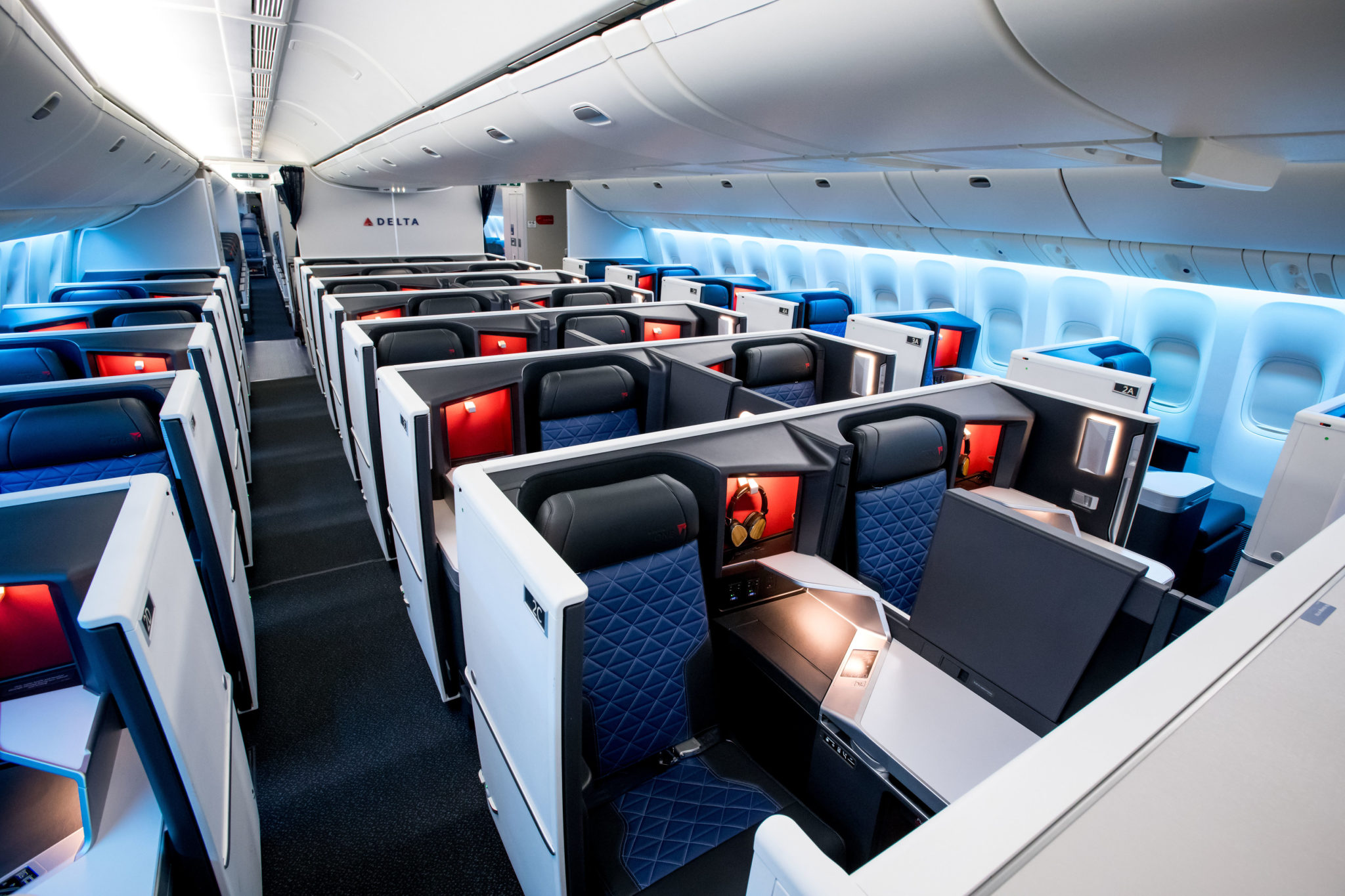 how to get upgraded to business class on delta